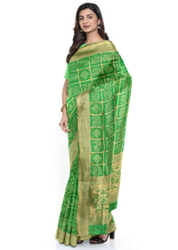 Emerald green banarasi silk saree with traditional motifs only on Kalki