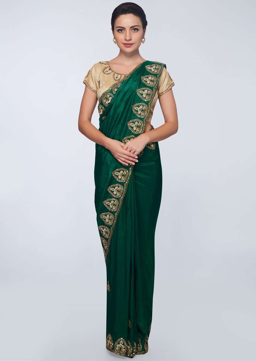 Emerald green  cotton silk saree in embroidered butti and border 