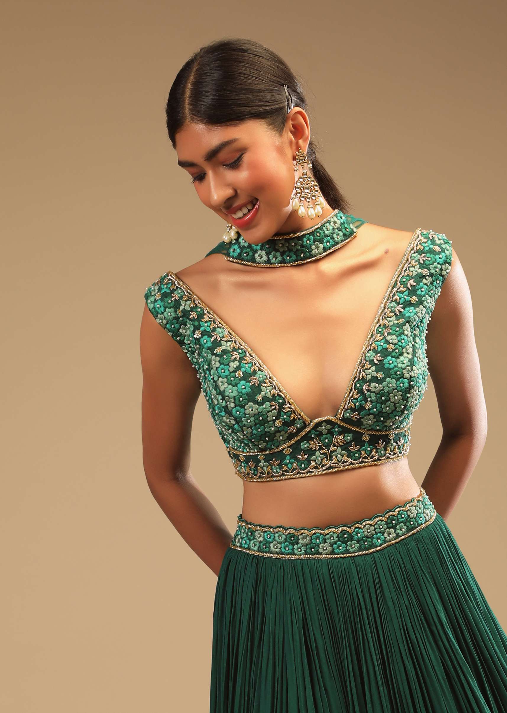 Emerald Green Lehenga In Georgette With A Plunging Neck Crop Top Featuring Floral Hand Work And Choker Dupatta