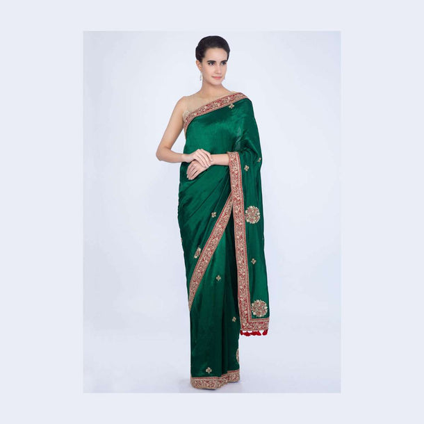 Emerald green silk saree with embroidered butti and border only on Kalki