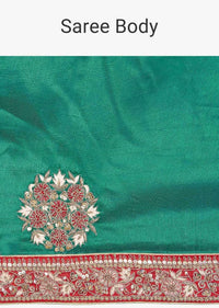 Emerald green silk saree with embroidered butti and border only on Kalki