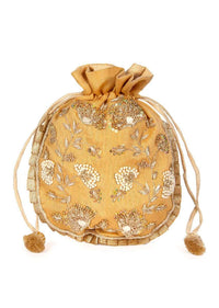 Ethnic beige potli bag embellished with zardosi and sequins embroidery only on kalki