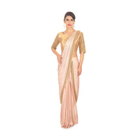 Fancy fabric peach blouse with lycra saree skirt in ready plated pre stitched pallo only on Kalki