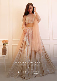 Melon Peach Ombre Lehenga Embellished In Sequins With Moti Embroidered Crop Top With Illusion Neckline And Full Sleeves