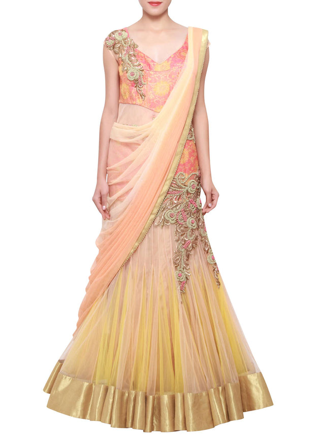 Peachy cream shaded lehenga sari embellished in zardosi only on Kalki