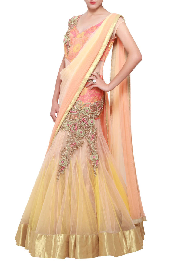 Peachy cream shaded lehenga sari embellished in zardosi only on Kalki