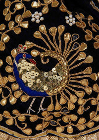 Featuring velvet potli bag in gotta patch work in peacock motif kalki