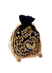 Featuring velvet potli bag in gotta patch work in peacock motif kalki
