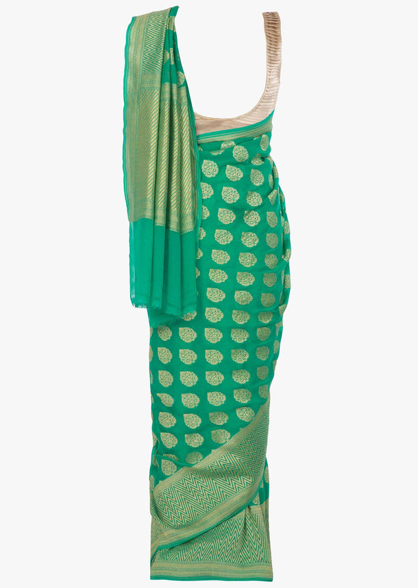 Fern green georgette saree in weaved butti and border