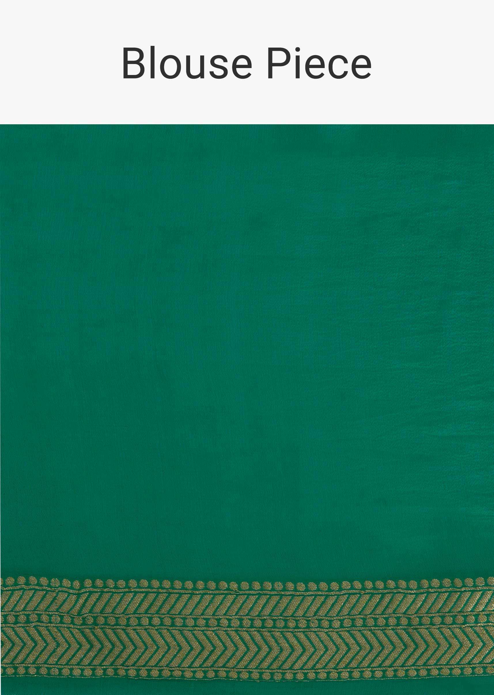 Fern green georgette saree in weaved butti and border