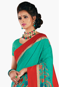 Fern green saree in floral print with red contrast border