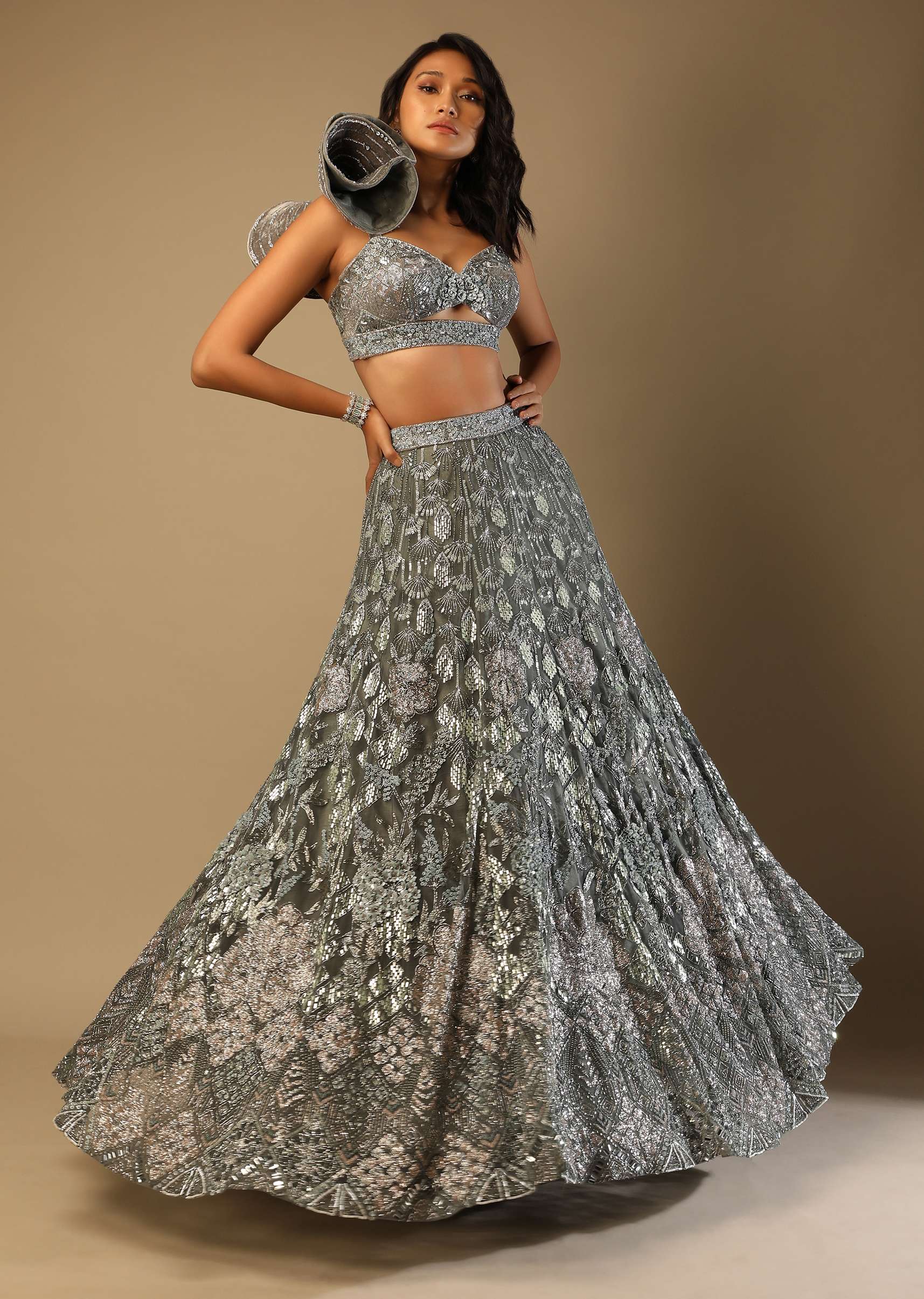 Fern Green Lehenga Choli In Net With Stone Hand Embroidered Floral Motifs And Fancy Origami Cones On The Shoulder