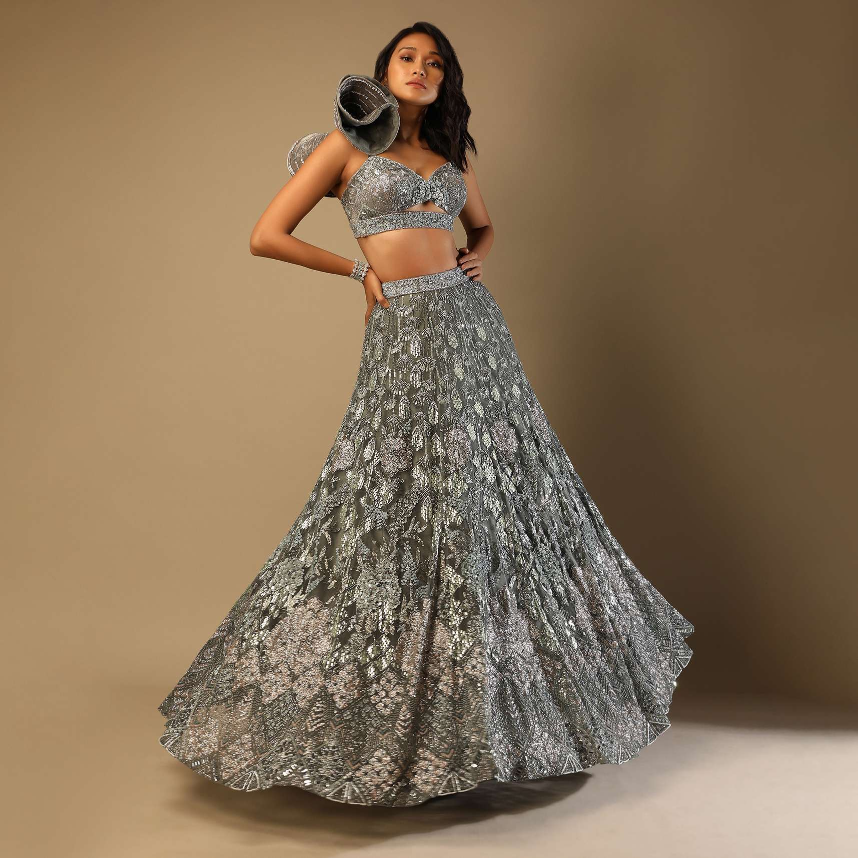 Fern Green Lehenga Choli In Net With Stone Hand Embroidered Floral Motifs And Fancy Origami Cones On The Shoulder