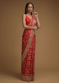 Fiery Red Saree With Bandhani Print And Gotta Patti Work Paired With Unstitched Blouse