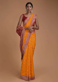 Fire Yellow Saree With Weaved Floral Buttis And Bandhani Printed Pallu Online - Kalki Fashion