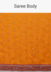 Fire Yellow Saree With Weaved Floral Buttis And Bandhani Printed Pallu Online - Kalki Fashion