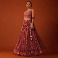 Fire Orange Bandhani Printed Lehenga And Blouse Set In Silk