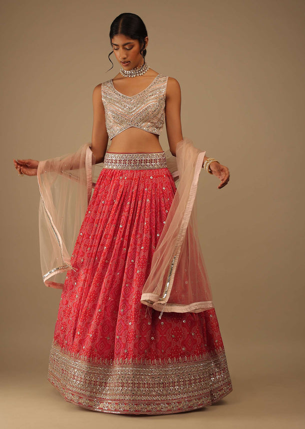 Flame Scarlet And Dahlia Pink Lehenga With A Crop Top In Digital Bandhani Print, Choli Comes In Foil Applique Floral Embroidery Buttis