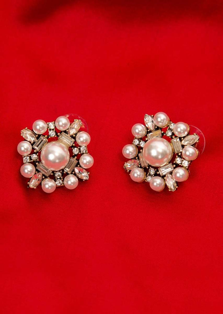 Floral cluster earring with pearls and stone