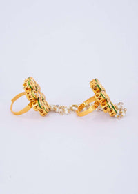 Floral shape polki kundan rings with attached multi layer moti chain only on Kalki