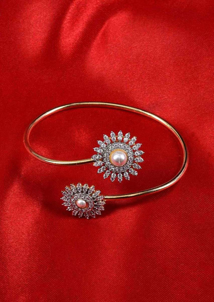 Floral shaped adjustable kada studded with cz stones and pearls only on Kalki