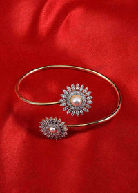 Floral shaped adjustable kada studded with cz stones and pearls only on Kalki