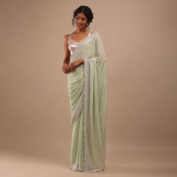 Foam Green Chiffon Saree In 3D Silver Petal And Floral Motifs Embroidery With Sequins Cascading Down