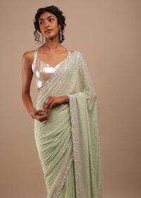 Foam Green Chiffon Saree In 3D Silver Petal And Floral Motifs Embroidery With Sequins Cascading Down