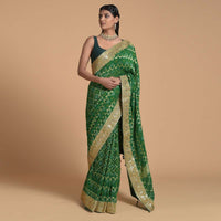 Forest Green Saree In Georgette With Brocade Woven Mesh And Bandhani Design