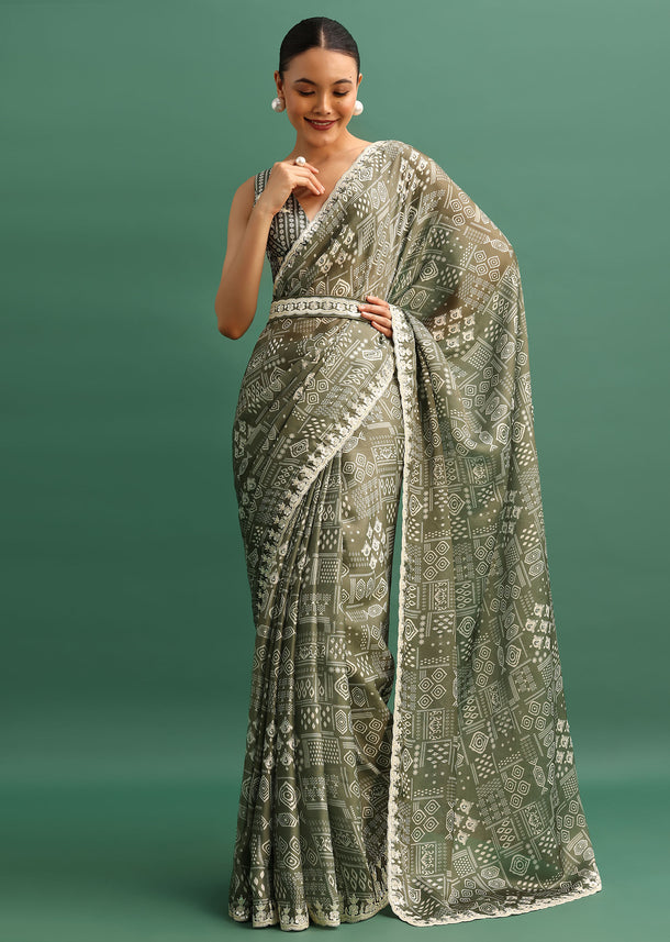 Forest Green Printed Satin Saree With Sequins Embroidered Border And Unstitched Blouse