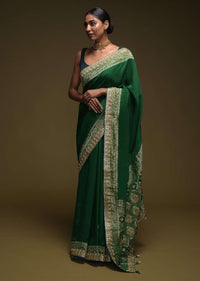 Forest Green Saree In Crepe Silk Blend With Gotta Patti Embroidered Buttis And Woven Border