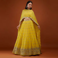 Daffodil Yellow Embroidered Lehenga In Georgette With Cape