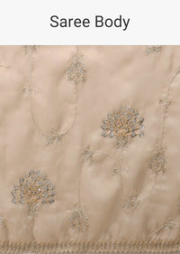 Frosted Almond Tissue Saree In Zardozi Embroidery Buttis, Leafy Motifs Embroidery Detailing On Border