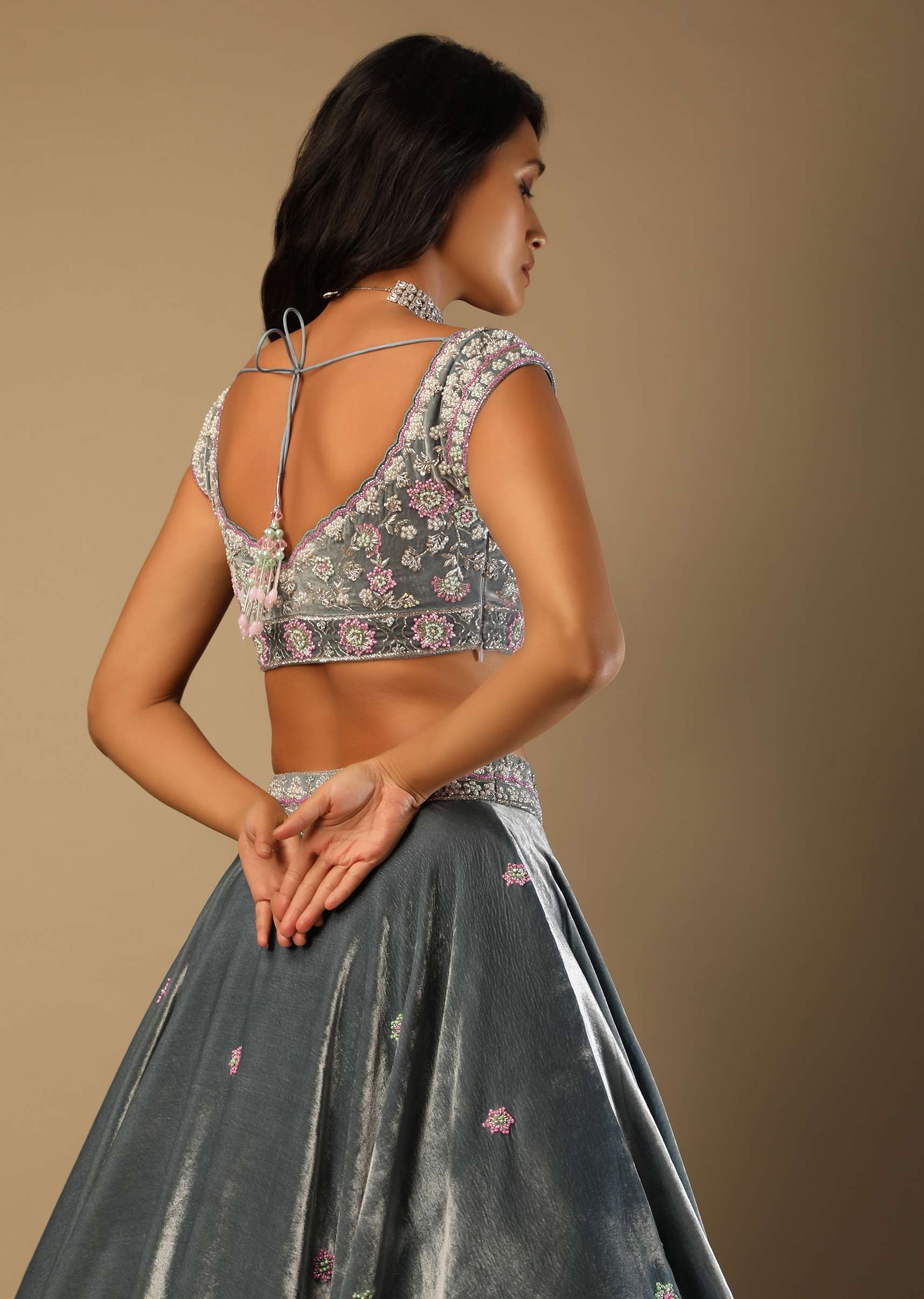 Frozen Blue Lehenga With Multi Colored Hand Embroidered Floral Buttis And Heavy Embroidered Choli