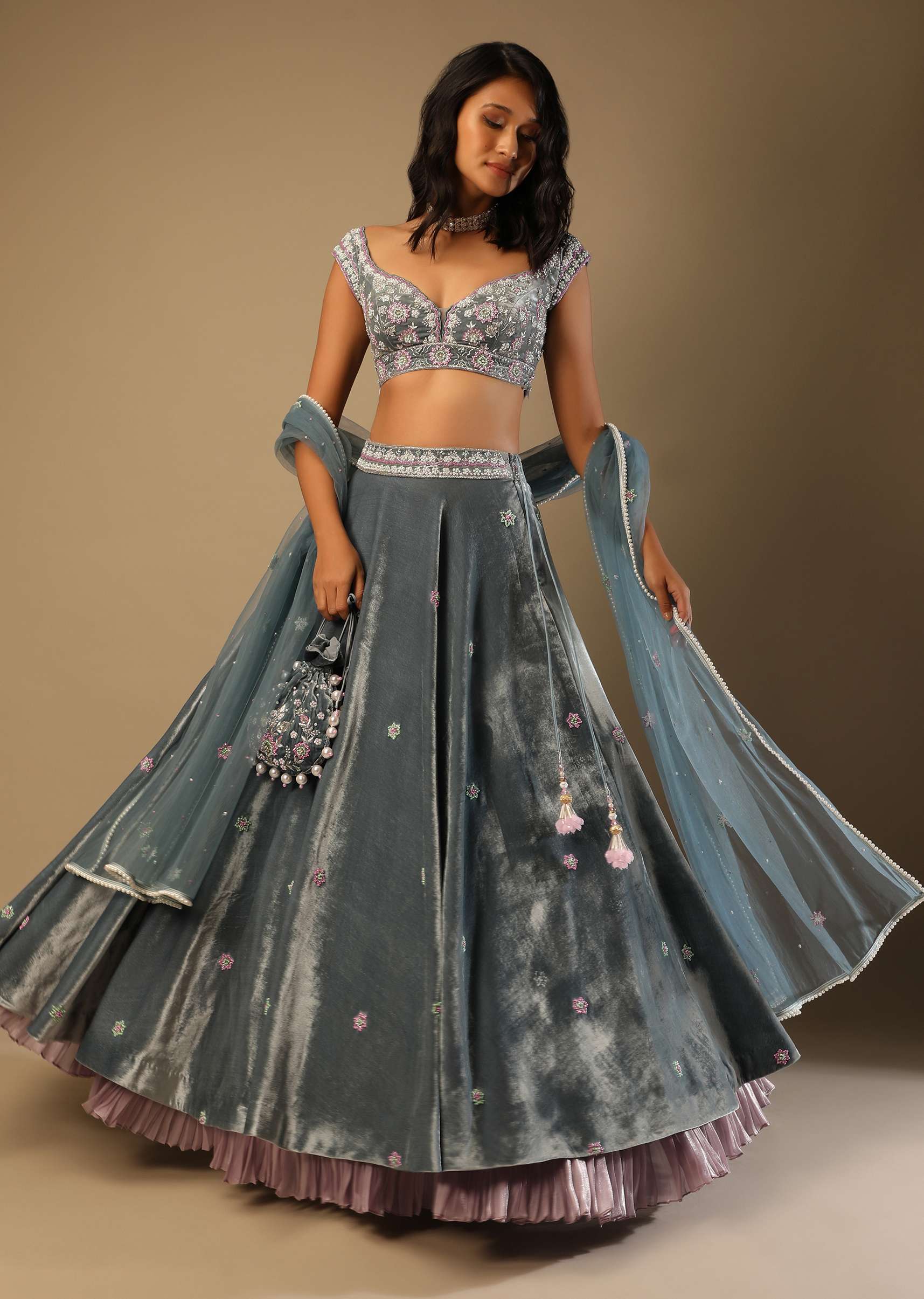 Frozen Blue Lehenga With Multi Colored Hand Embroidered Floral Buttis And Heavy Embroidered Choli