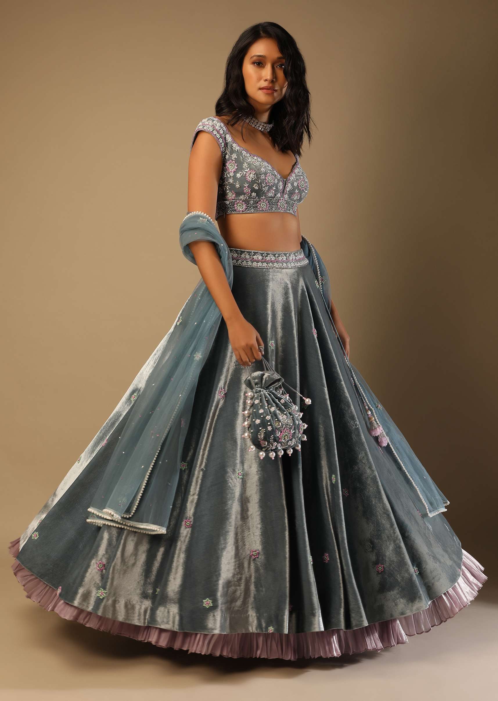 Frozen Blue Lehenga With Multi Colored Hand Embroidered Floral Buttis And Heavy Embroidered Choli