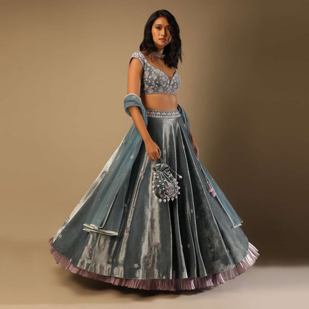 Frozen Blue Lehenga With Multi Colored Hand Embroidered Floral Buttis And Heavy Embroidered Choli