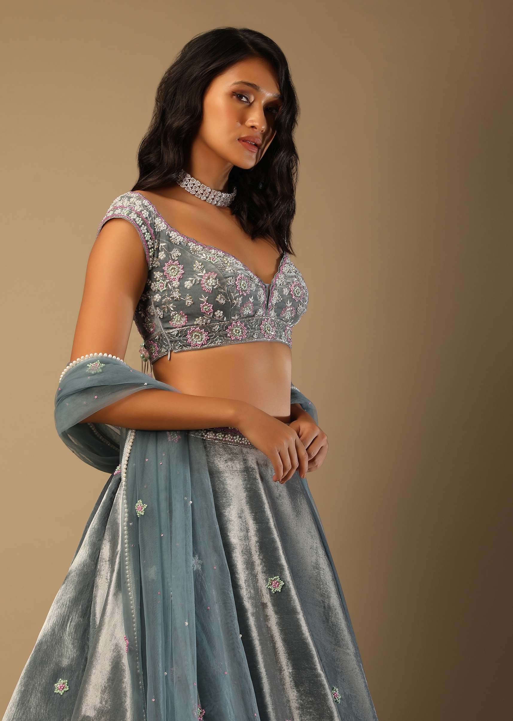 Frozen Blue Lehenga With Multi Colored Hand Embroidered Floral Buttis And Heavy Embroidered Choli