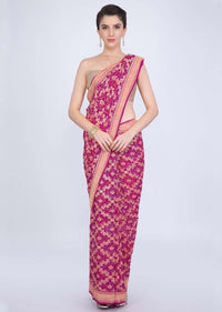 Fuchsia pink georgette saree with weaved jaal work  and bandhani print only on kalki