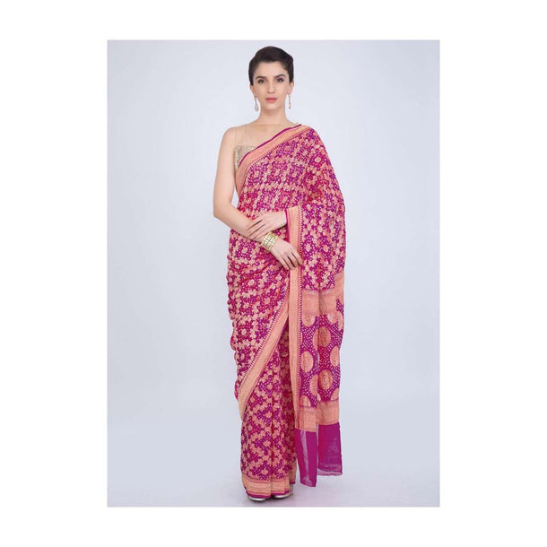 Fuchsia pink georgette saree with weaved jaal work  and bandhani print only on kalki