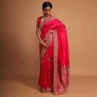 Fuchsia pink khadi silk saree embellished with hand embroideries s and weaved butti Online - Kalki Fashion