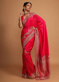 Fuchsia pink khadi silk saree embellished with hand embroideries s and weaved butti Online - Kalki Fashion