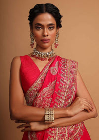 Fuchsia pink khadi silk saree embellished with hand embroideries s and weaved butti Online - Kalki Fashion