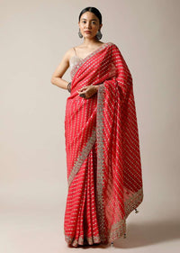 Fuchsia Pink Saree In Brocade Silk With Woven Stripes And Gotta Embroidered Border Along With Unstitched Blouse