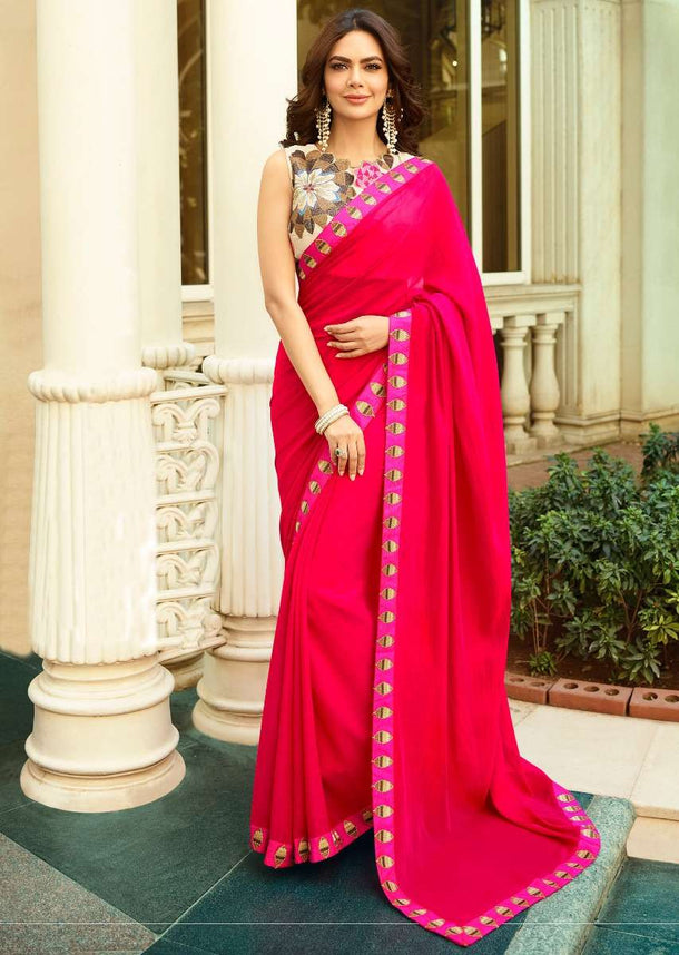 Fuchsia pink saree with floral embroidered unstitched blouse Online - Kalki Fashion