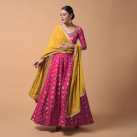 Fuchsia Pink Anarkali Suit In Silk With Woven Patola Design And Abla Embroidered Neckline