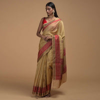 Gold Beige Pure Handloom Saree In Tussar Silk With Woven Floral Buttis And Red Border Online - Kalki Fashion