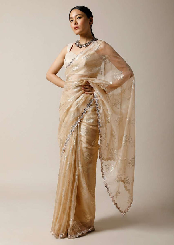 Gold Beige Saree In Organza With Foil Printed Floral Buttis And Mirror Work On The Border Along With Unstitched Blouse Online - Kalki Fashion