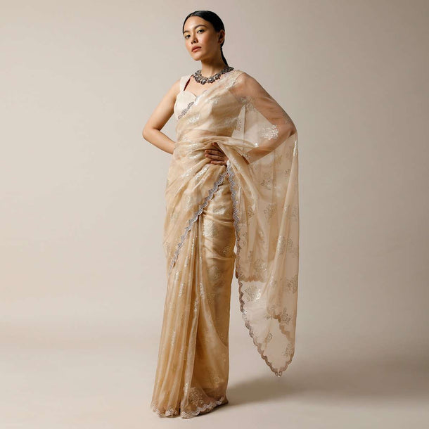 Gold Beige Saree In Organza With Foil Printed Floral Buttis And Mirror Work On The Border Along With Unstitched Blouse Online - Kalki Fashion