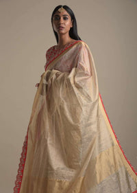 Gold Beige Saree In Zari Kota Silk With Red Scallop Border And Tassels On The Pallu Online - Kalki Fashion